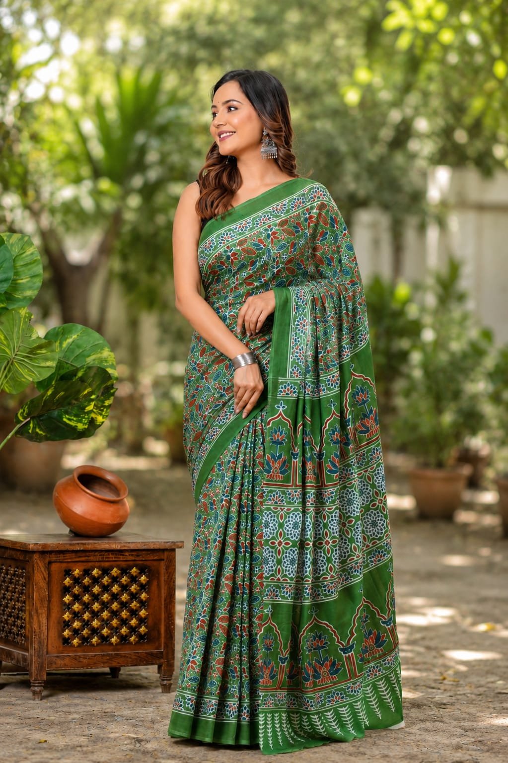 Green saree with floral and jaal motifs in Bagru hand block print design