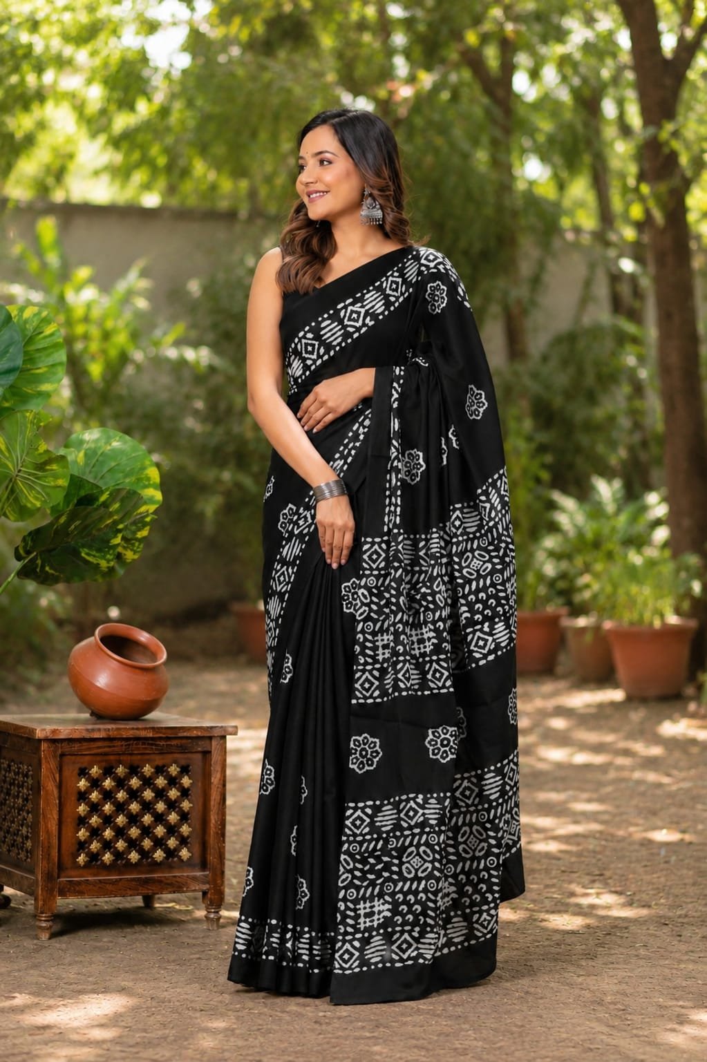 Black saree with white floral and geometric Bagru hand block prints