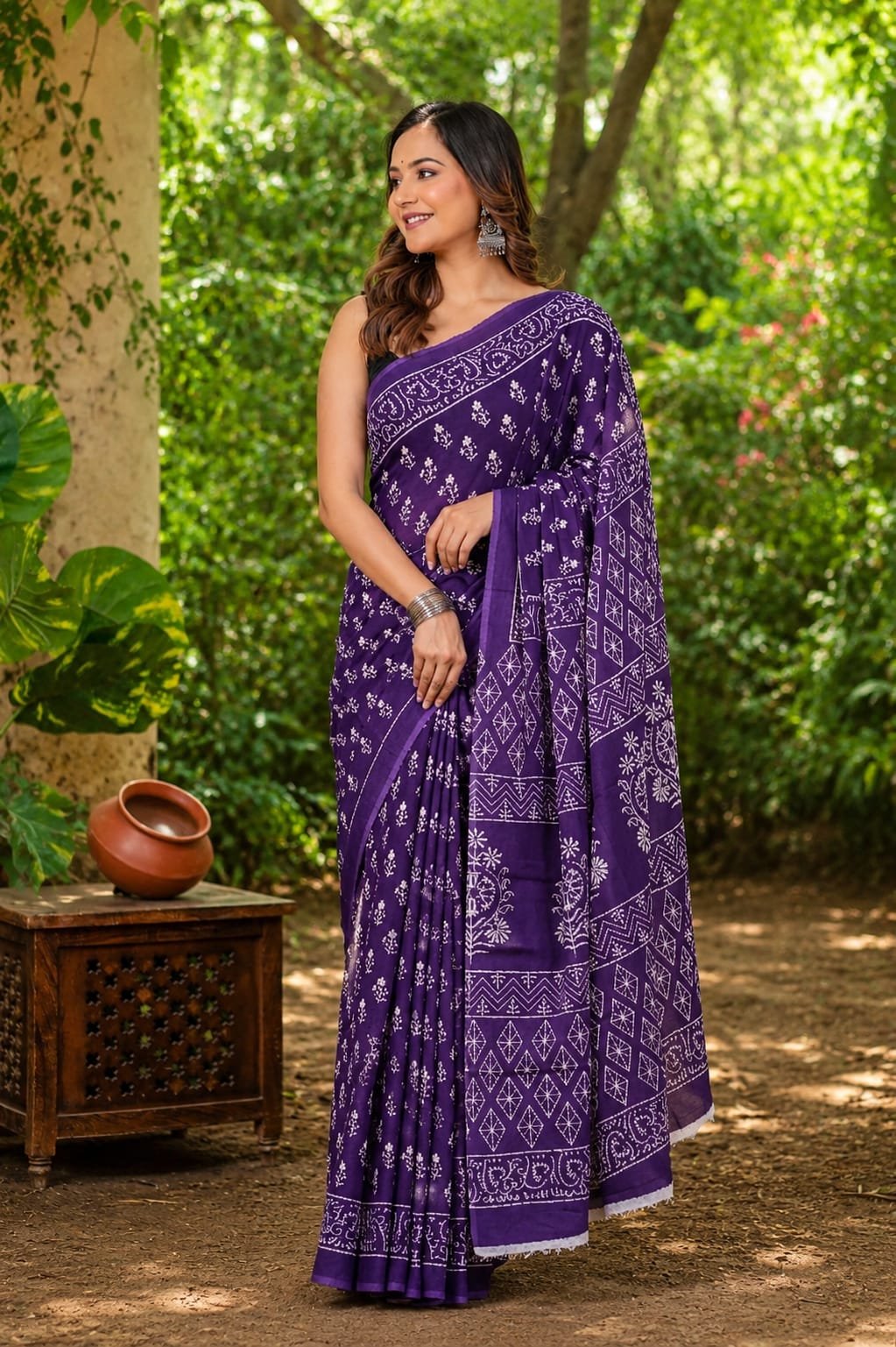 Purple saree with geometric and floral motifs in Bagru hand block print