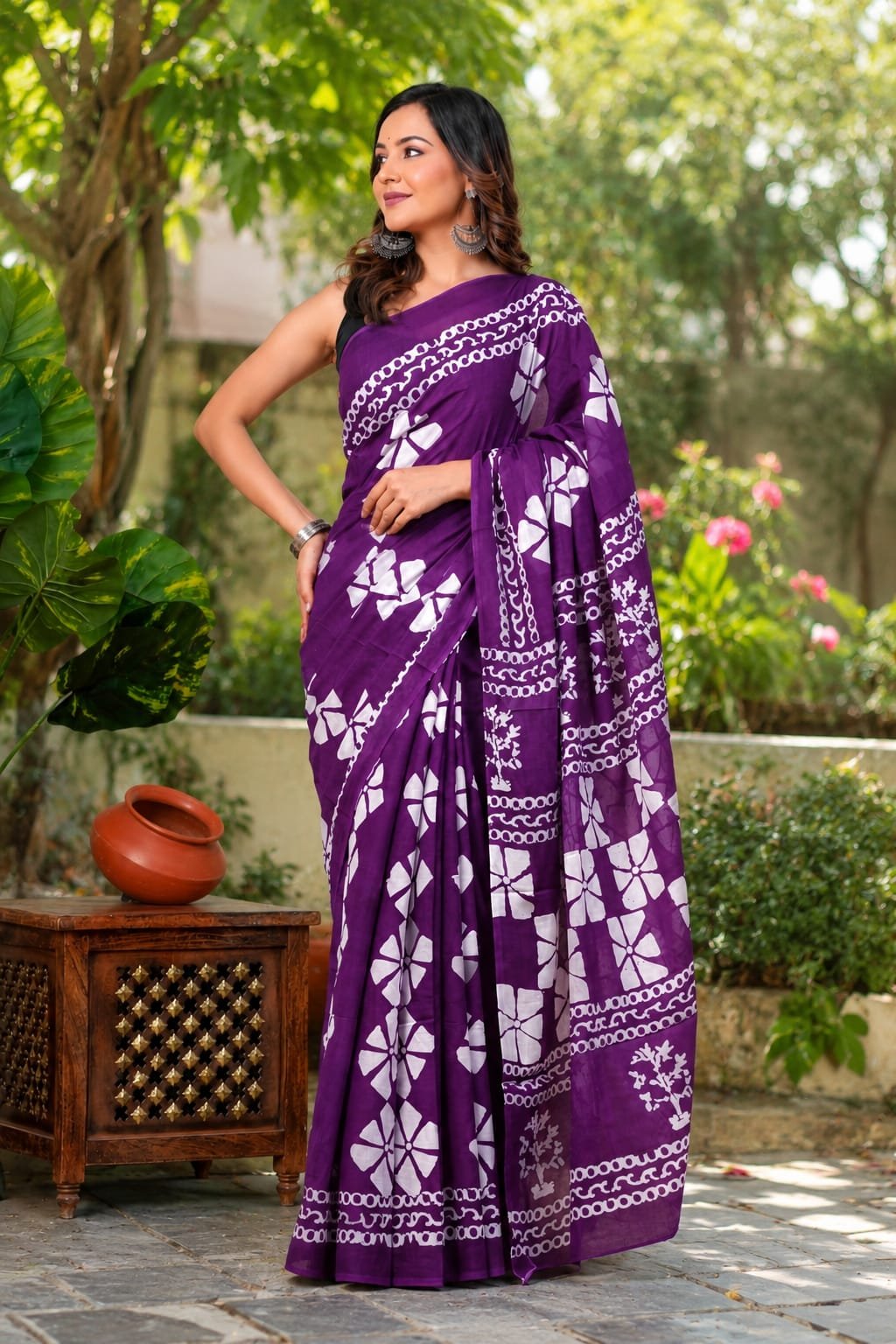 Purple saree with floral motifs and hand block print design