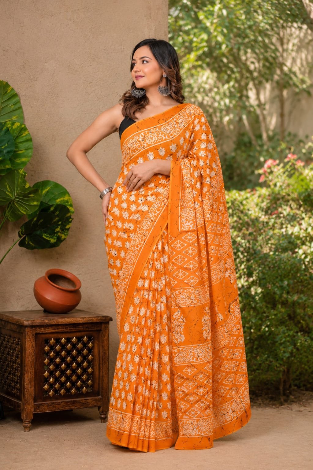 Orange saree with floral and geometric motifs, Bagru hand block print