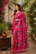 Pink saree with deep indigo floral motifs and traditional Bagru block print