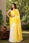 Yellow Mul Cotton saree with white floral motifs in Bagru hand block print