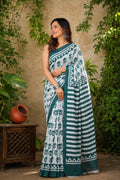 Teal floral and geometric Bagru saree with stripes and border