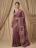 Mauve saree with floral motifs and intricate border design