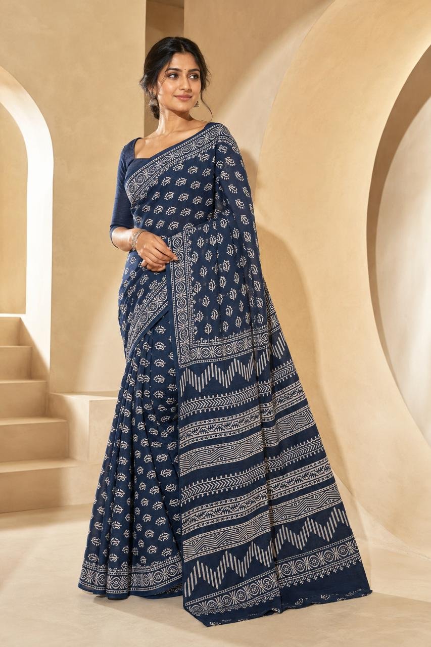 Navy blue saree with floral and geometric motifs in Bagru hand block print