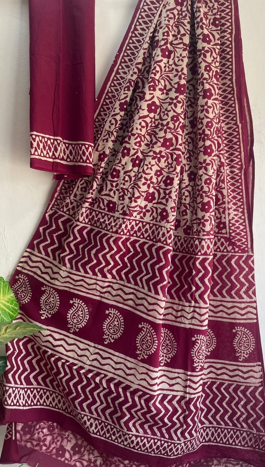 Maroon saree with floral and geometric Bagru hand block print motifs
