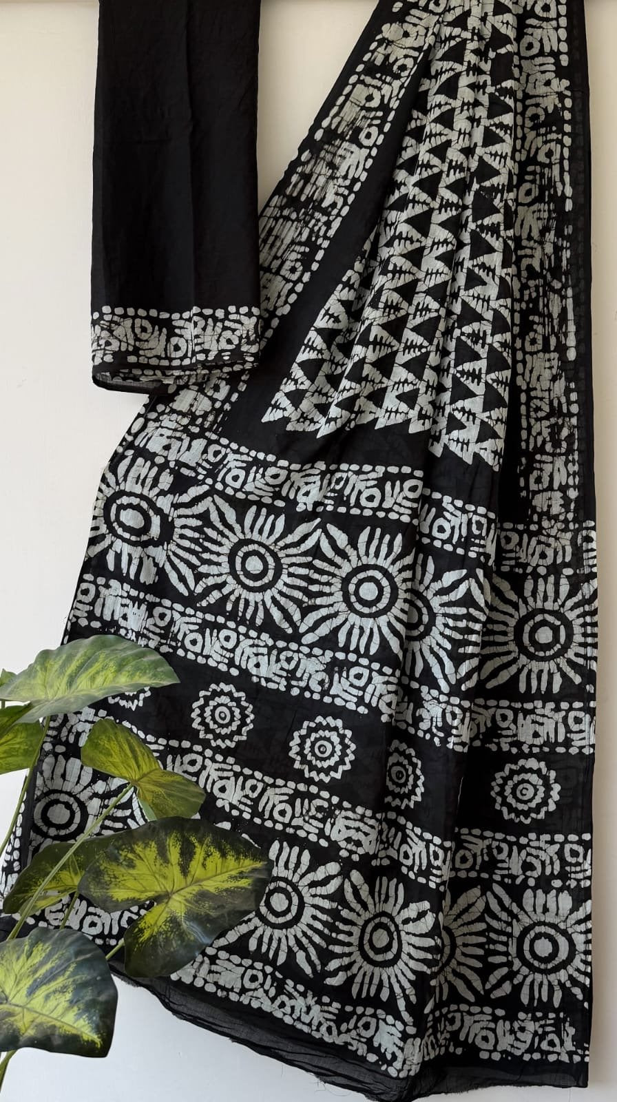 Black saree with white floral and geometric Bagru print motifs