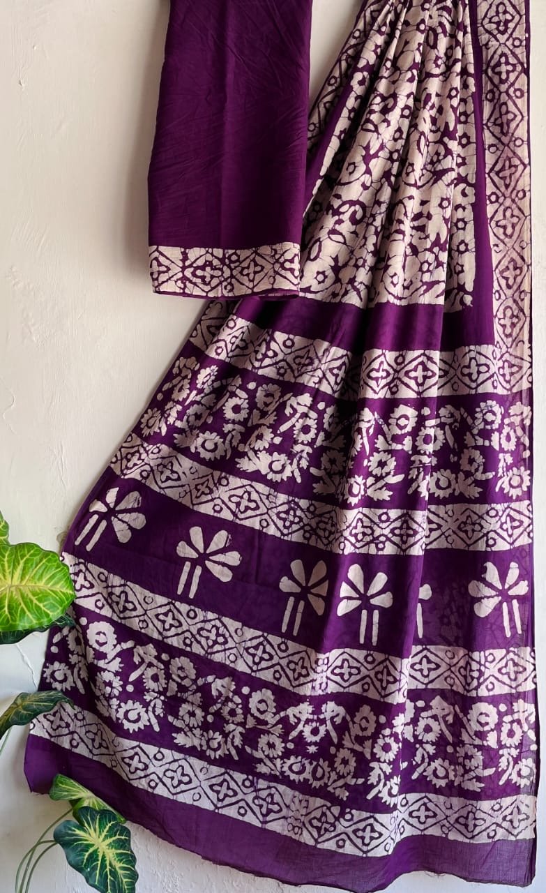 Purple saree with floral and geometric block print patterns