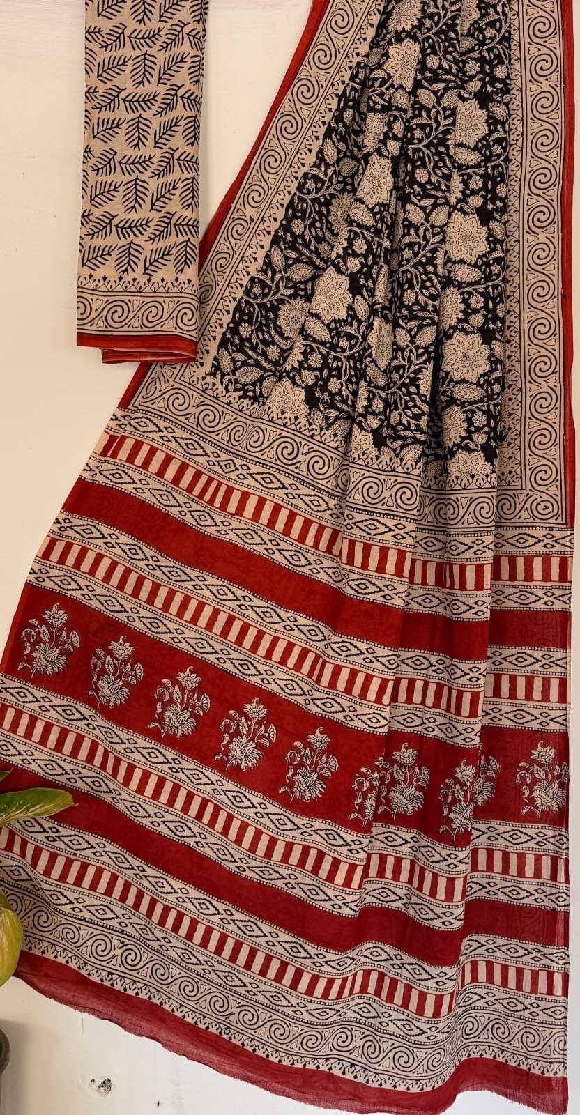 Red and black saree with floral and geometric hand block print motifs