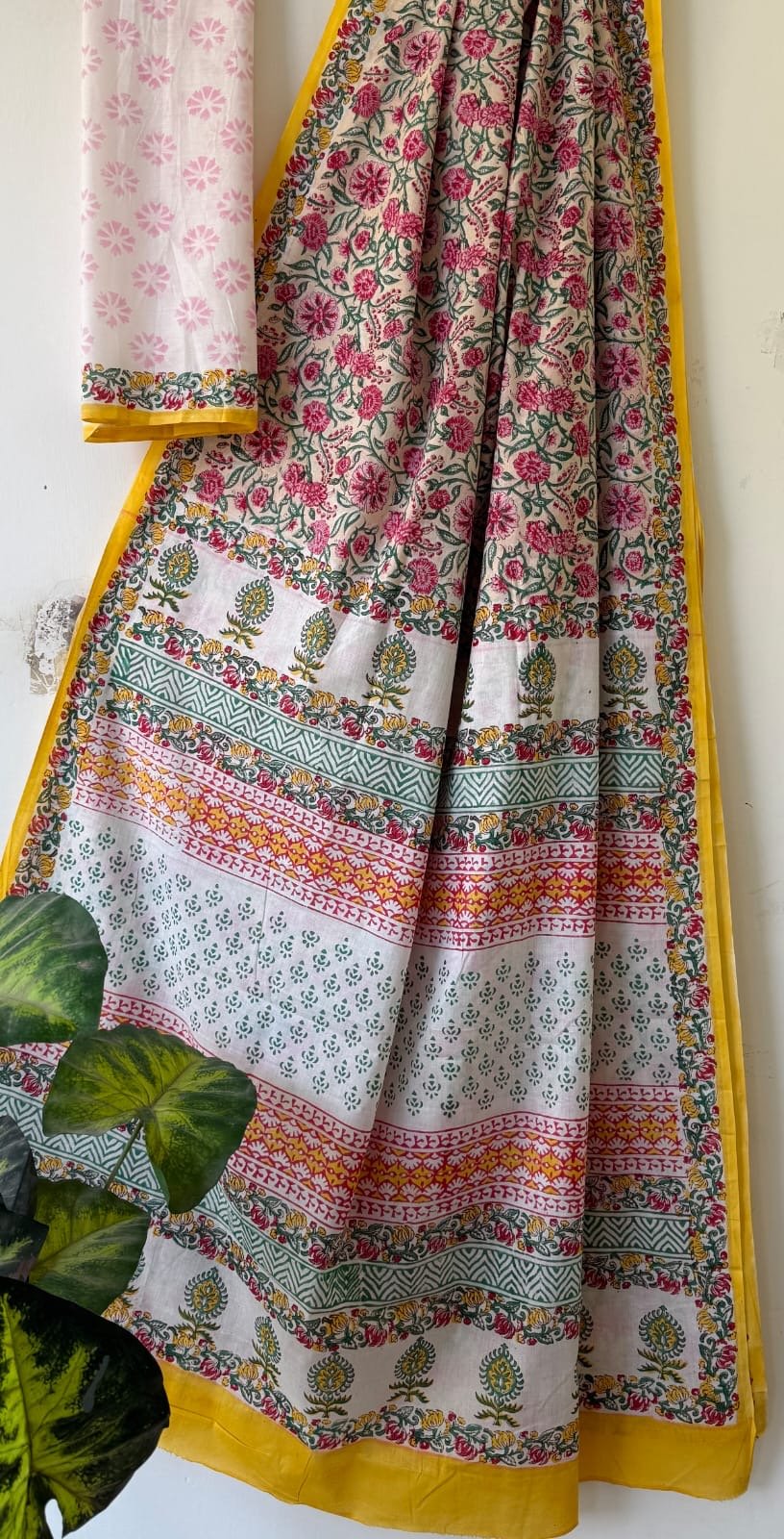 Pink floral Bagru hand block print saree with intricate border design