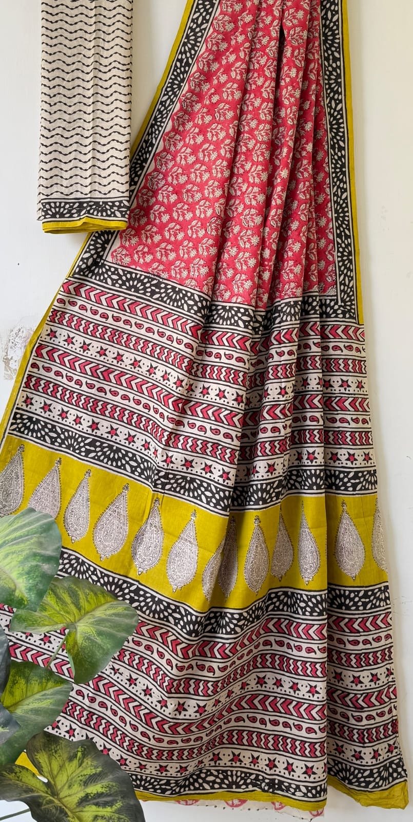 Red and yellow saree with floral and geometric Bagru block print motifs