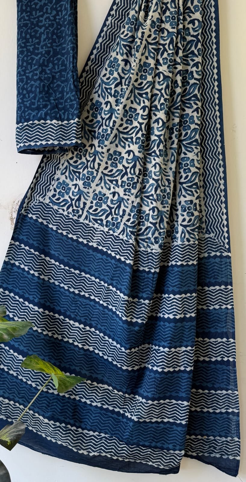 Indigo saree with floral and striped motifs in traditional Bagru print