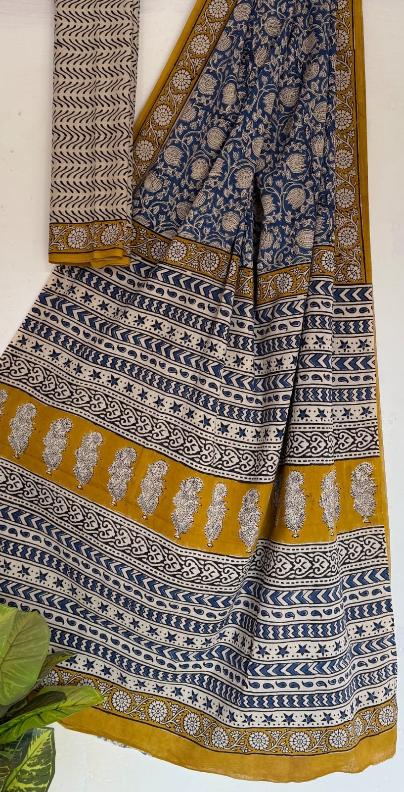Mustard and blue saree with floral and geometric Bagru motifs