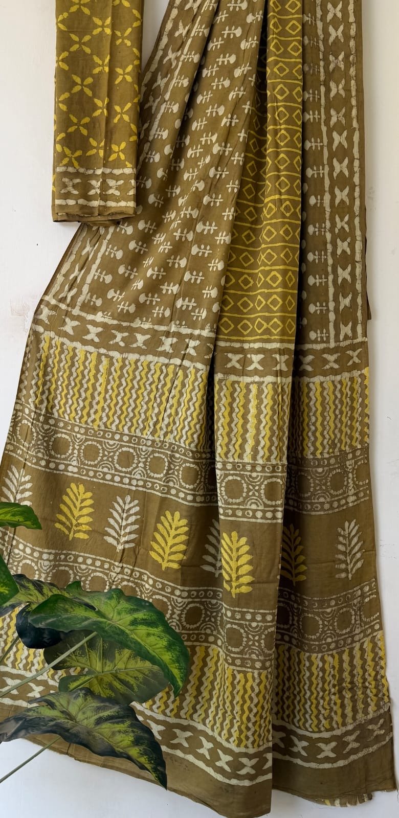 Olive and yellow saree featuring floral and geometric Bagru hand block print motifs
