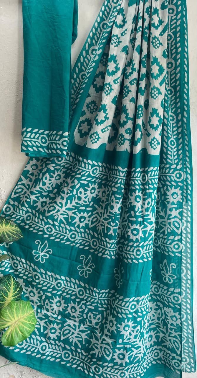 Teal saree with white floral motifs and Bagru hand block print