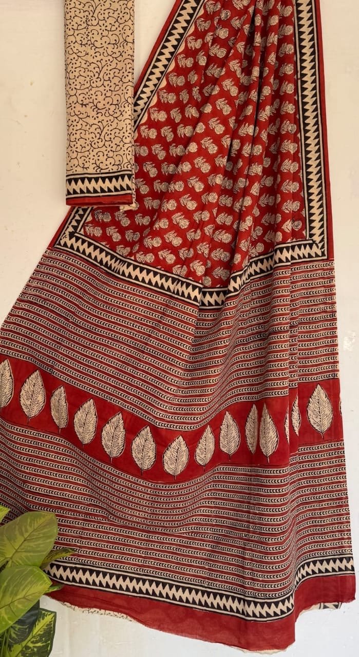 Red saree with leaf motifs and geometric patterns in Bagru print