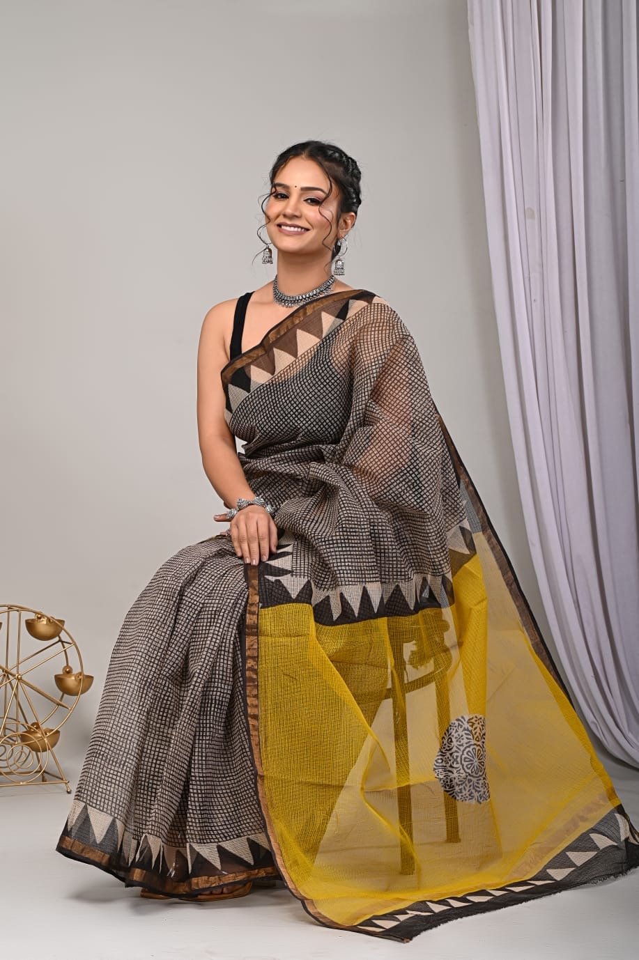 Black and yellow Kota Doriya saree with geometric Bagru hand block print motifs