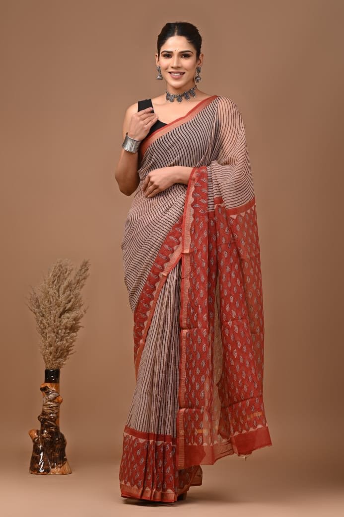 Red saree with floral Bagru hand block print and traditional motifs