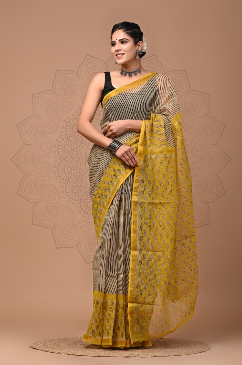Yellow and black saree with striped and buta motifs in Kota Doriya fabric