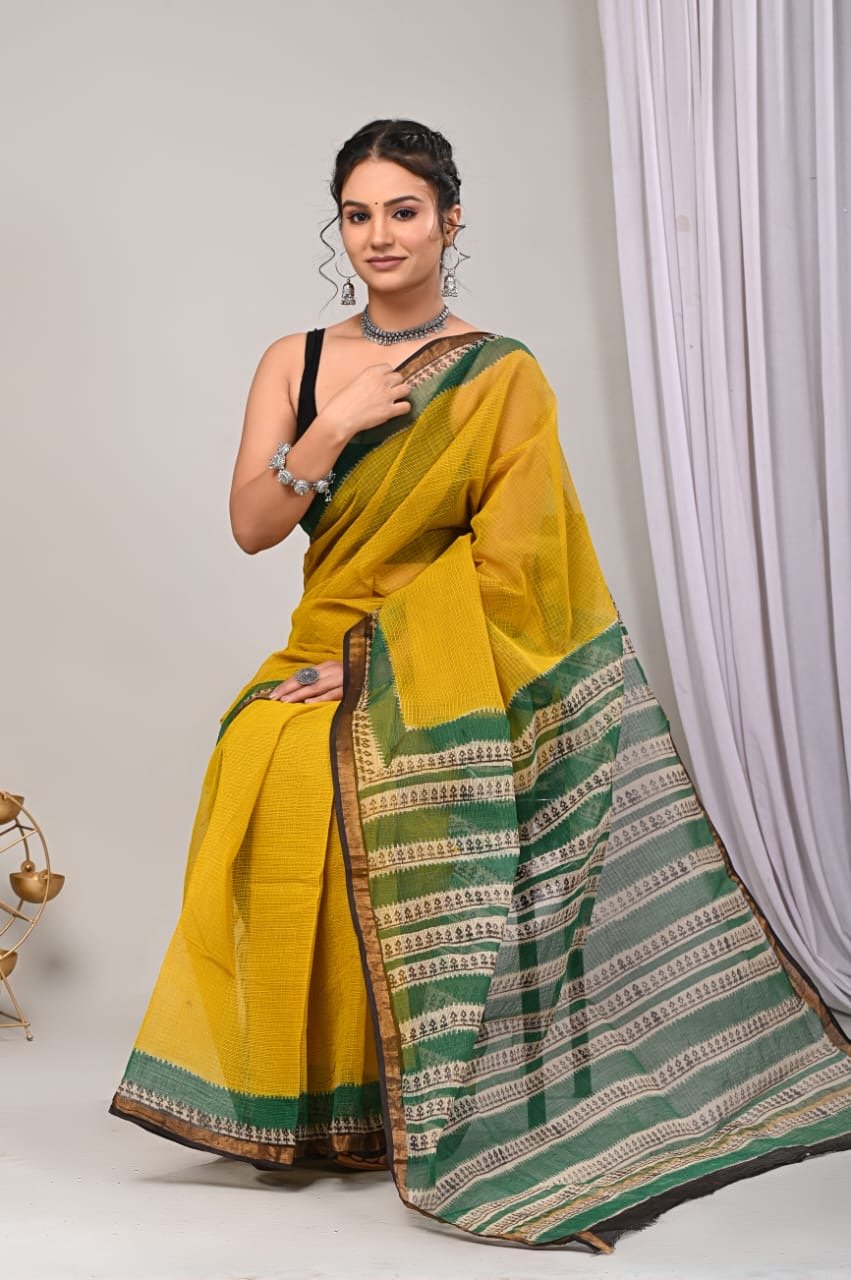 Yellow Kota Doriya silk saree with green border and block print motifs