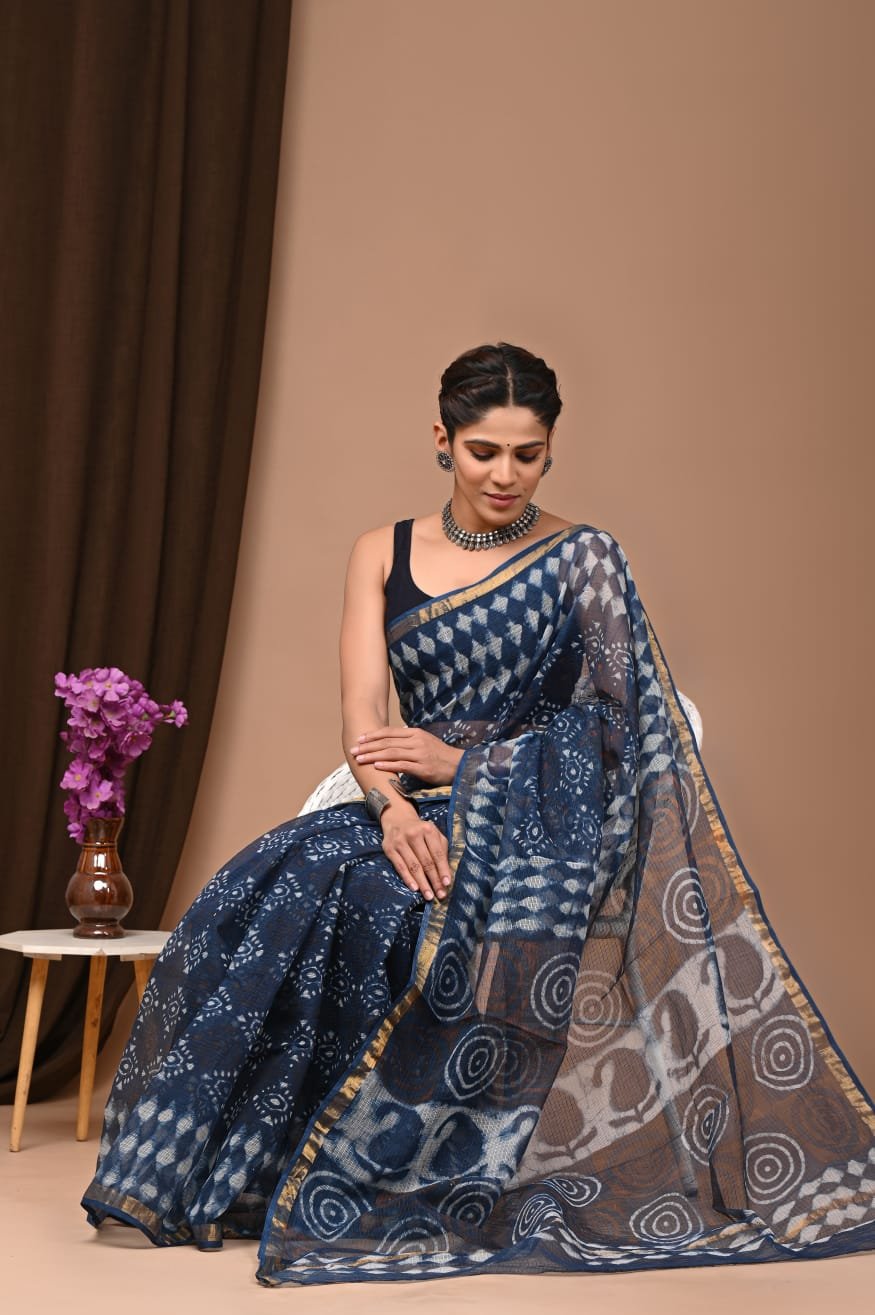 Navy blue saree with geometric patterns and circular motifs in Bagru print