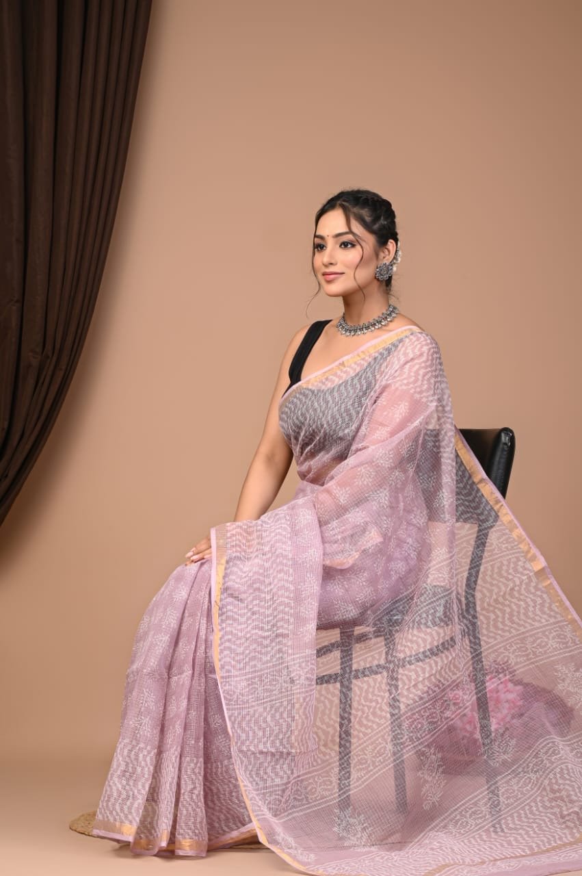 Lavender saree with floral Bagru prints and golden border