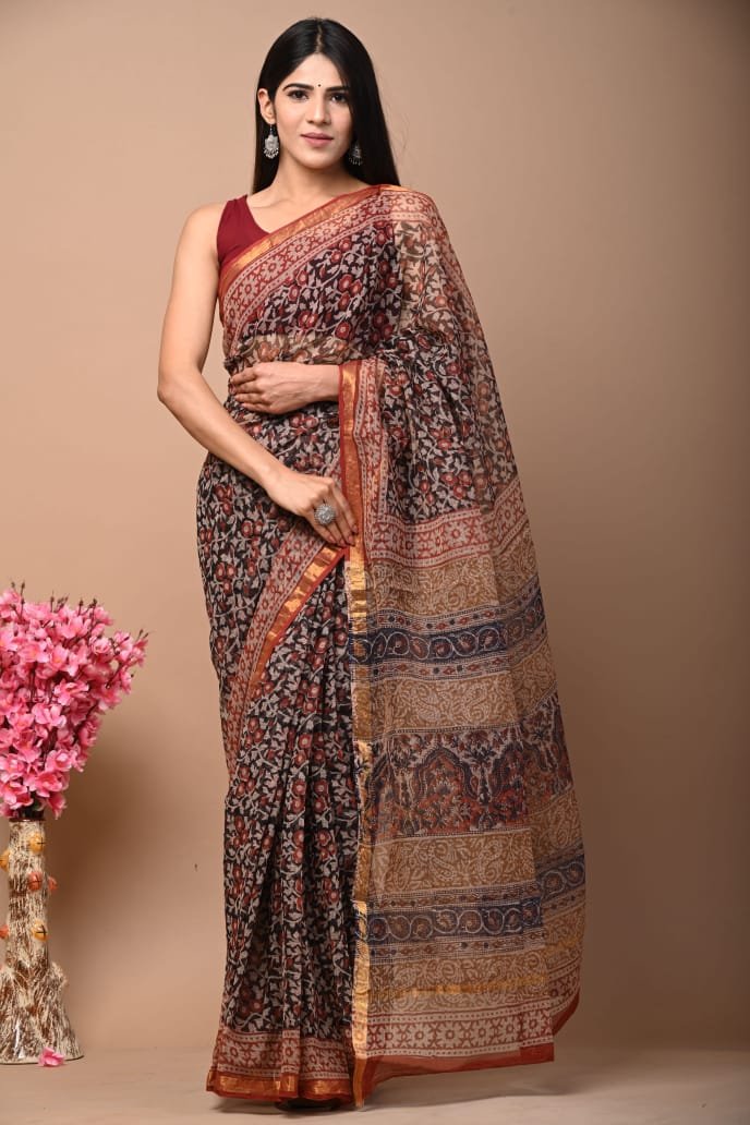 Maroon and black saree with floral motifs and intricate borders