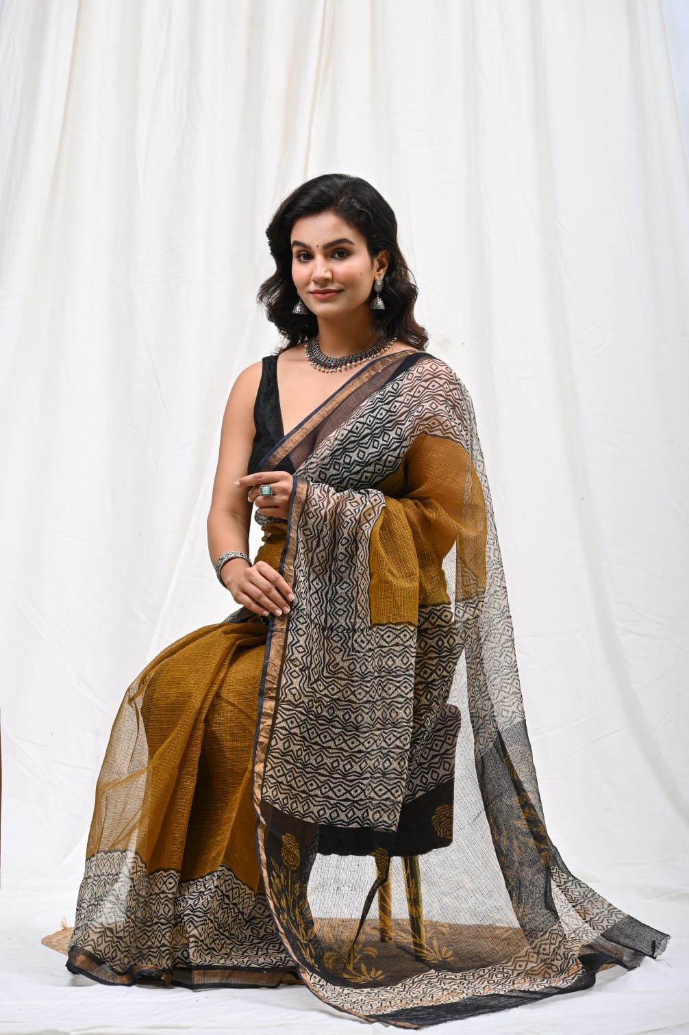 Mustard and black saree with geometric Bagru hand block print and khat texture