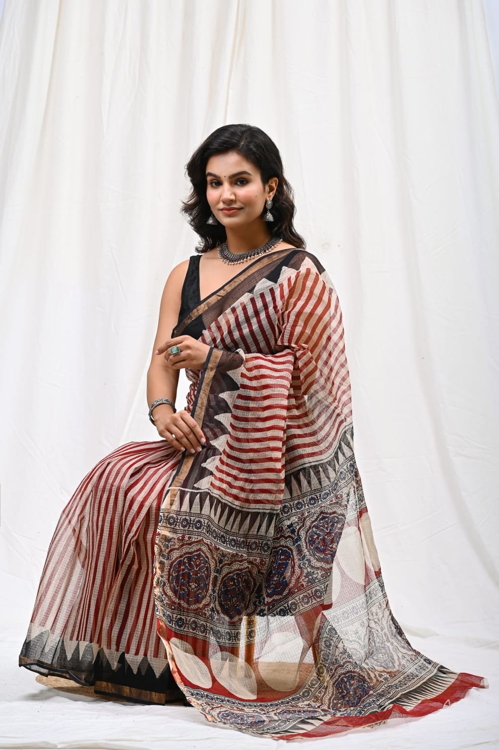Kota Doriya Silk saree with red and black stripes, geometric and floral Bagru motifs