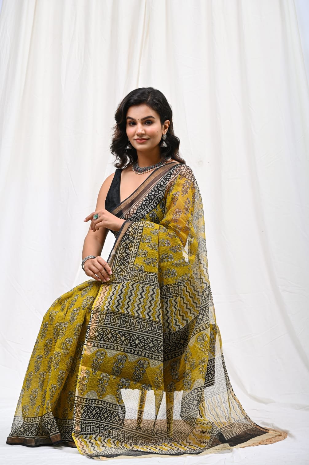 Yellow Kota Doriya saree with floral Bagru block print and bold borders