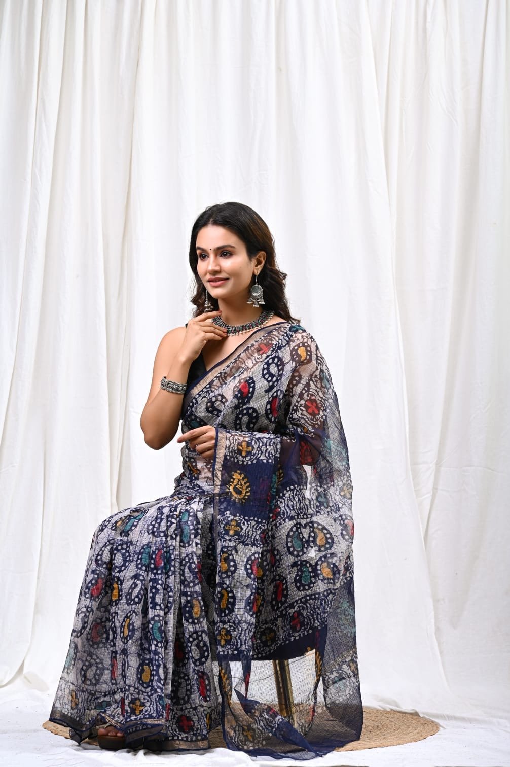 Navy blue saree with floral Bagru hand block prints and khat texture