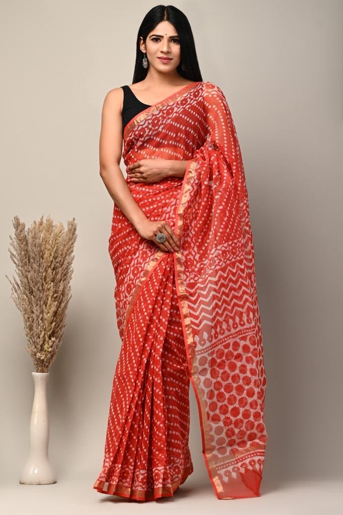 Red saree with geometric and buta patterns, showcasing Bagru hand block print