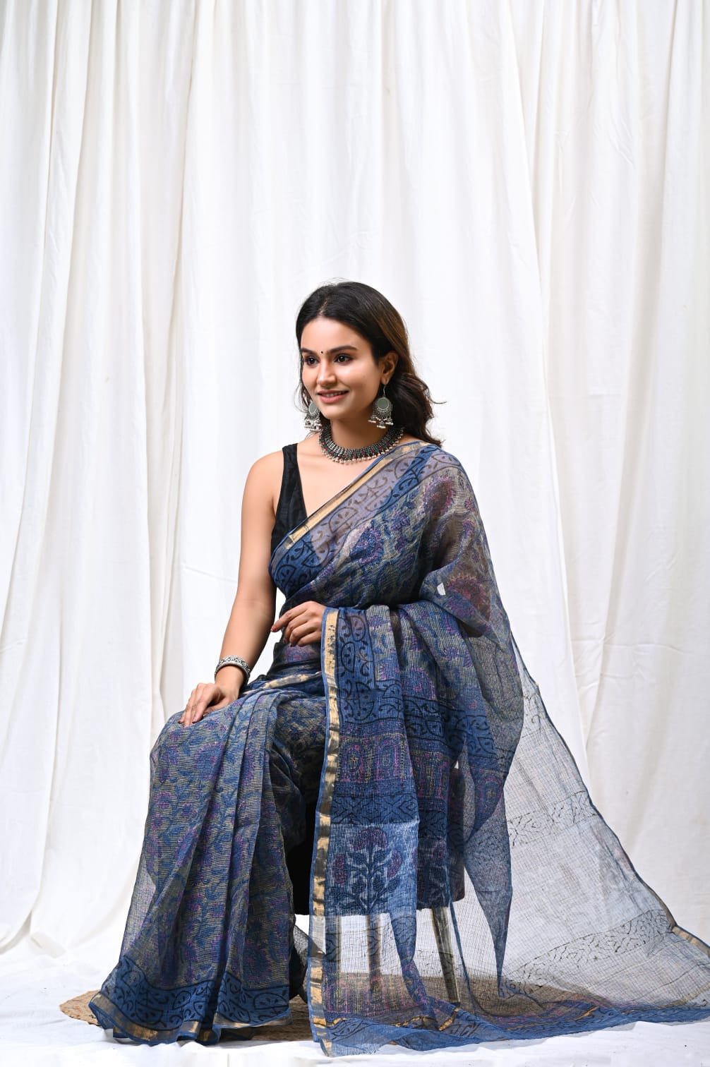 Navy blue saree with floral Bagru hand block print and khat texture