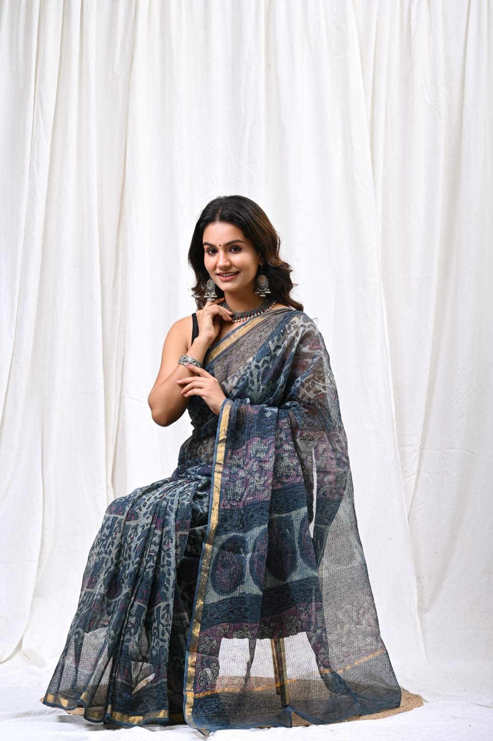 Navy blue saree with floral Bagru block print and distinctive khat texture