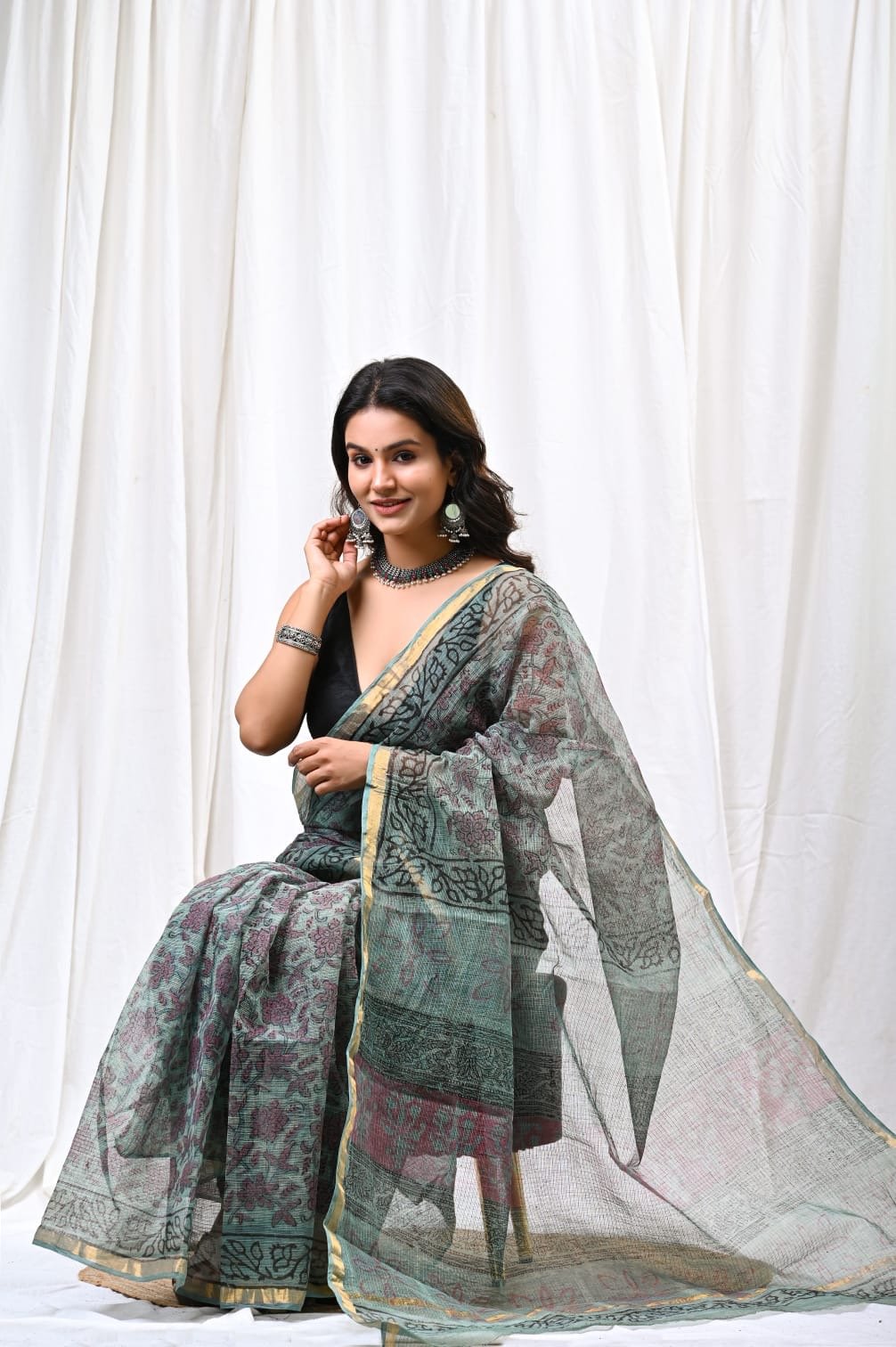 Green saree with floral Bagru hand block prints and khat texture