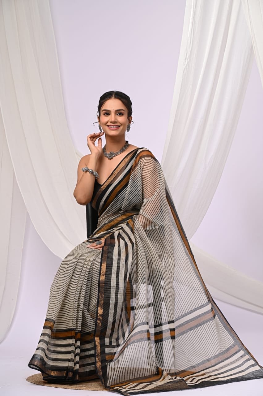 Black and gold striped Kota Doriya saree with hand block print