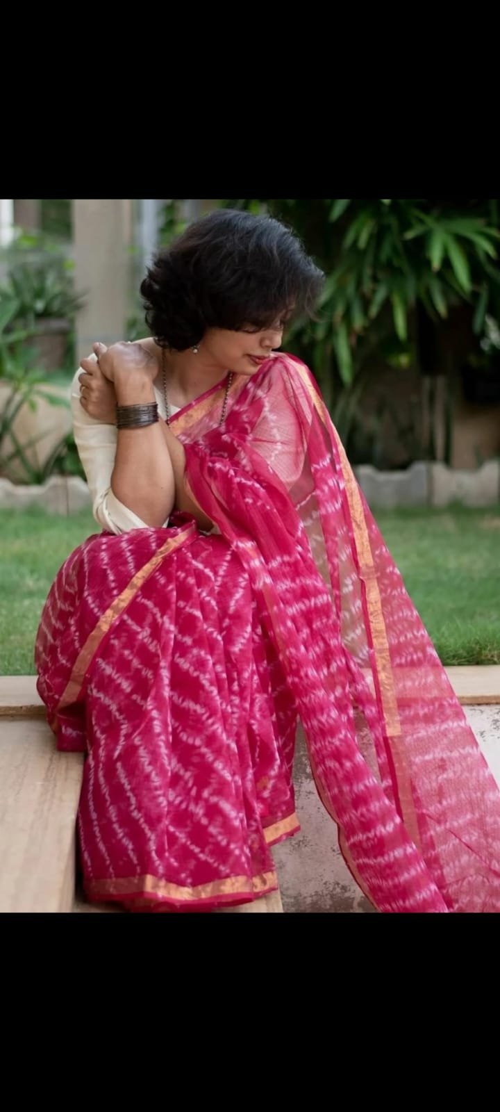 Pink Kota Doriya saree with white block print and golden border
