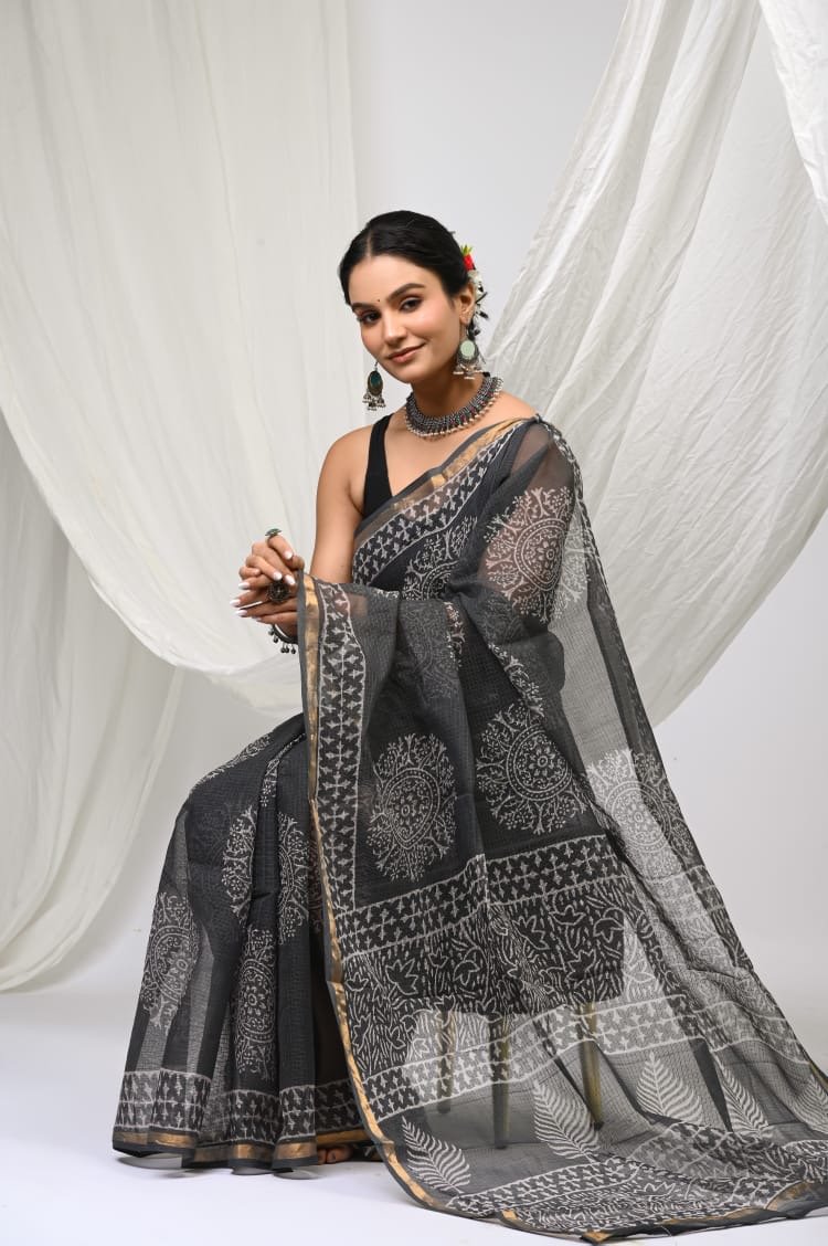 Black Kota Doriya saree with floral Bagru hand block print and border