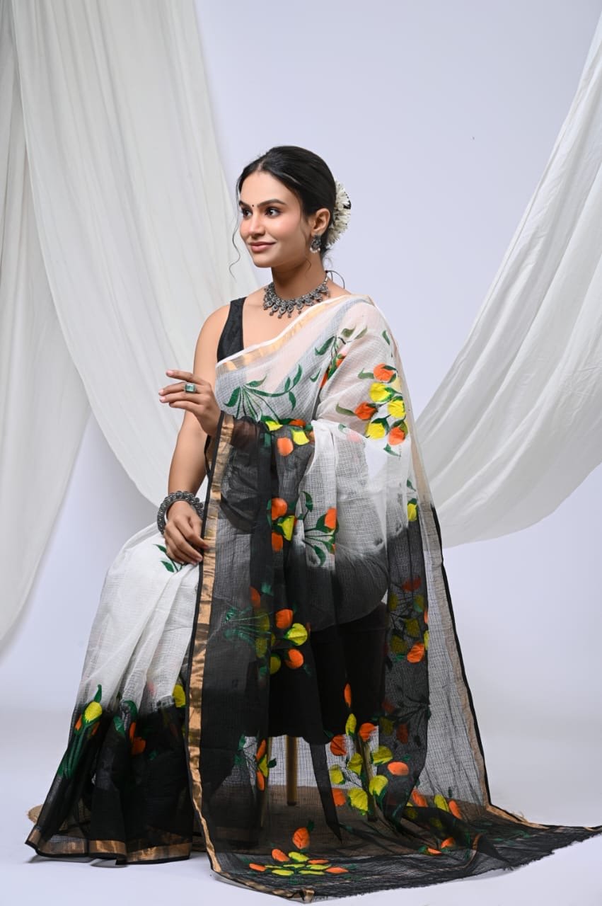 Black and white kota doriya saree with vibrant floral motifs