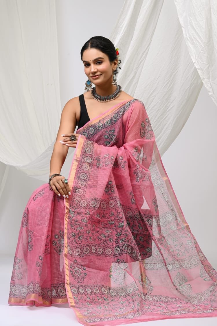 Pink saree with floral motifs and khat texture showcasing Bagru hand block print