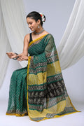 Green and yellow Kota Doriya silk saree with floral prints and geometric patterns