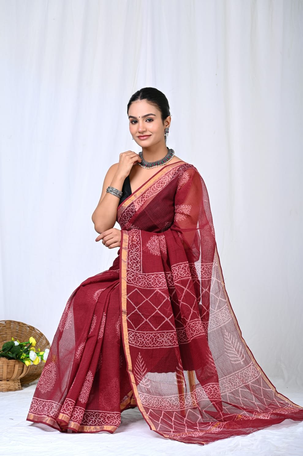 Maroon Kota Doriya saree with geometric Bagru hand block print motifs