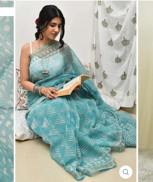 Aqua saree with geometric block print motifs in Kota Doriya silk style