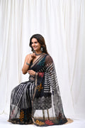 Black saree with multicolor floral motifs and geometric patterns using Bagru hand block print