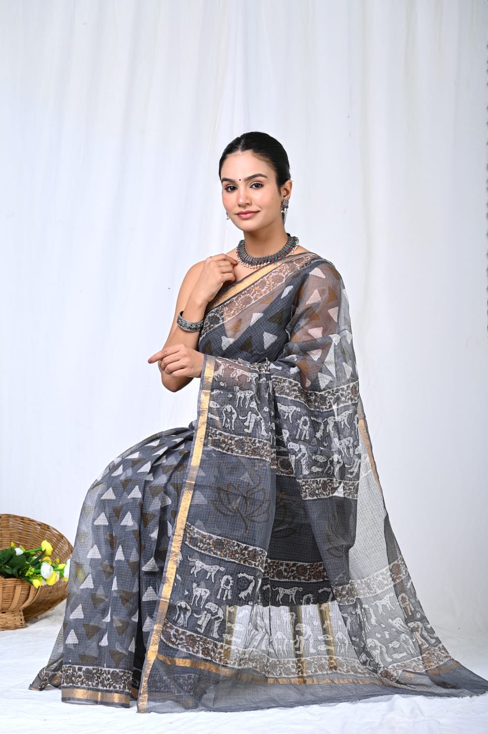 Grey Kota Doriya silk saree with geometric motifs and intricate border