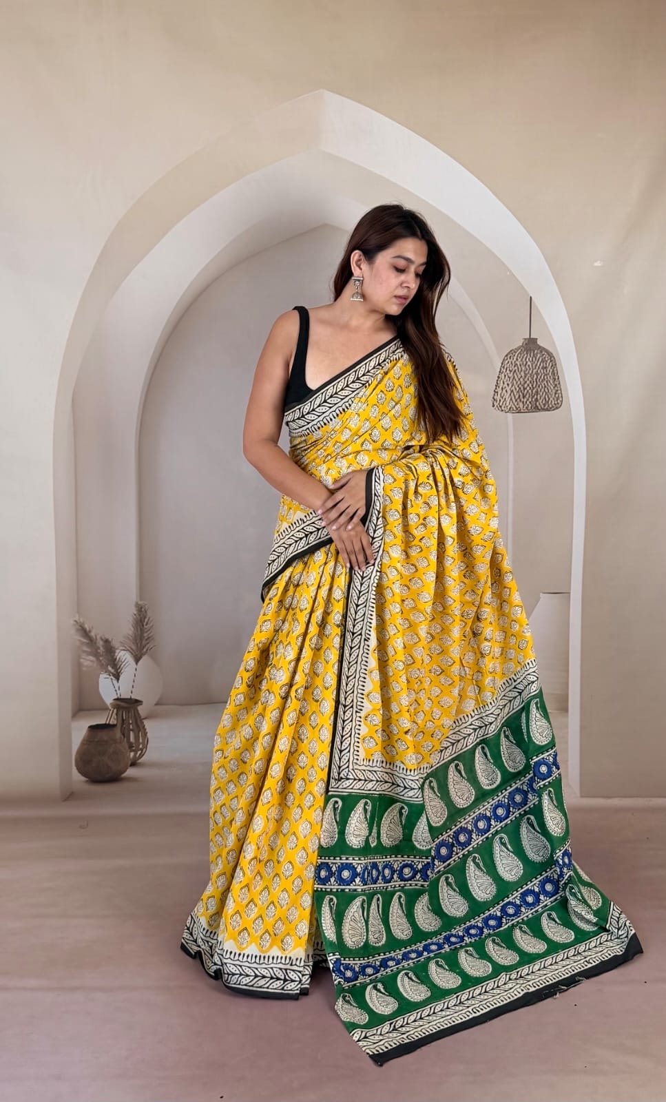 Yellow Mul Cotton saree with buta and green pallu motif