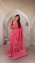 Pink saree with floral motifs and intricate border, Bagru hand block print