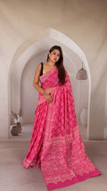 Pink saree with floral motifs, crafted with Bagru hand block print