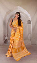 Yellow saree with white floral motifs and traditional Bagru hand block print